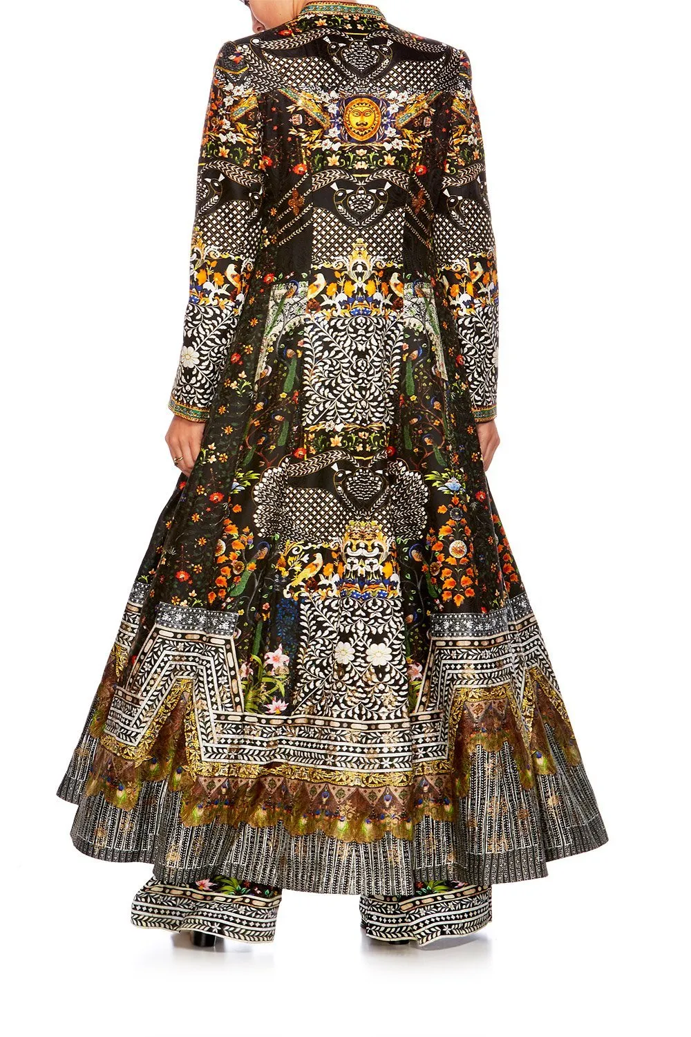 LONG PANELLED COAT BEHIND CLOSED DOORS