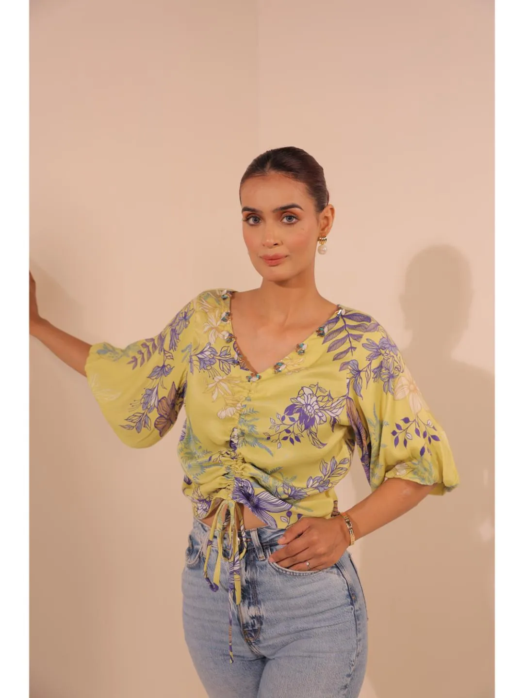 modish viscose royal satin floral printed V-Neck centre front draw string tie-up top with bishop sleeve . - Yellow