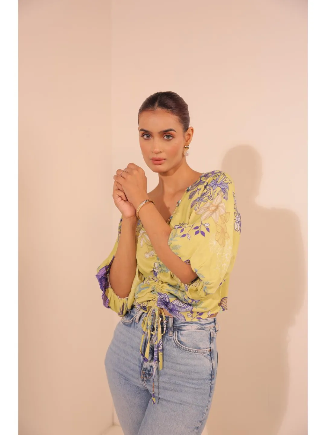 modish viscose royal satin floral printed V-Neck centre front draw string tie-up top with bishop sleeve . - Yellow