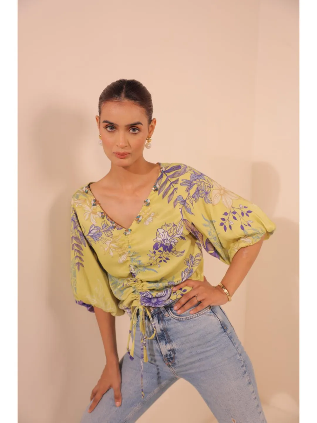 modish viscose royal satin floral printed V-Neck centre front draw string tie-up top with bishop sleeve . - Yellow