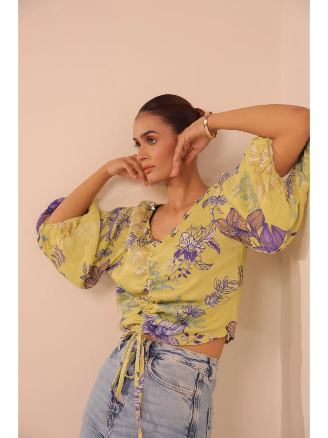 modish viscose royal satin floral printed V-Neck centre front draw string tie-up top with bishop sleeve . - Yellow